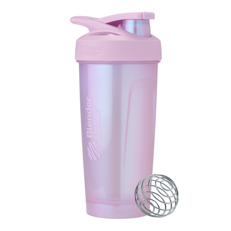 A pastel pink BlenderBottle with BlenderBall wire whisk.