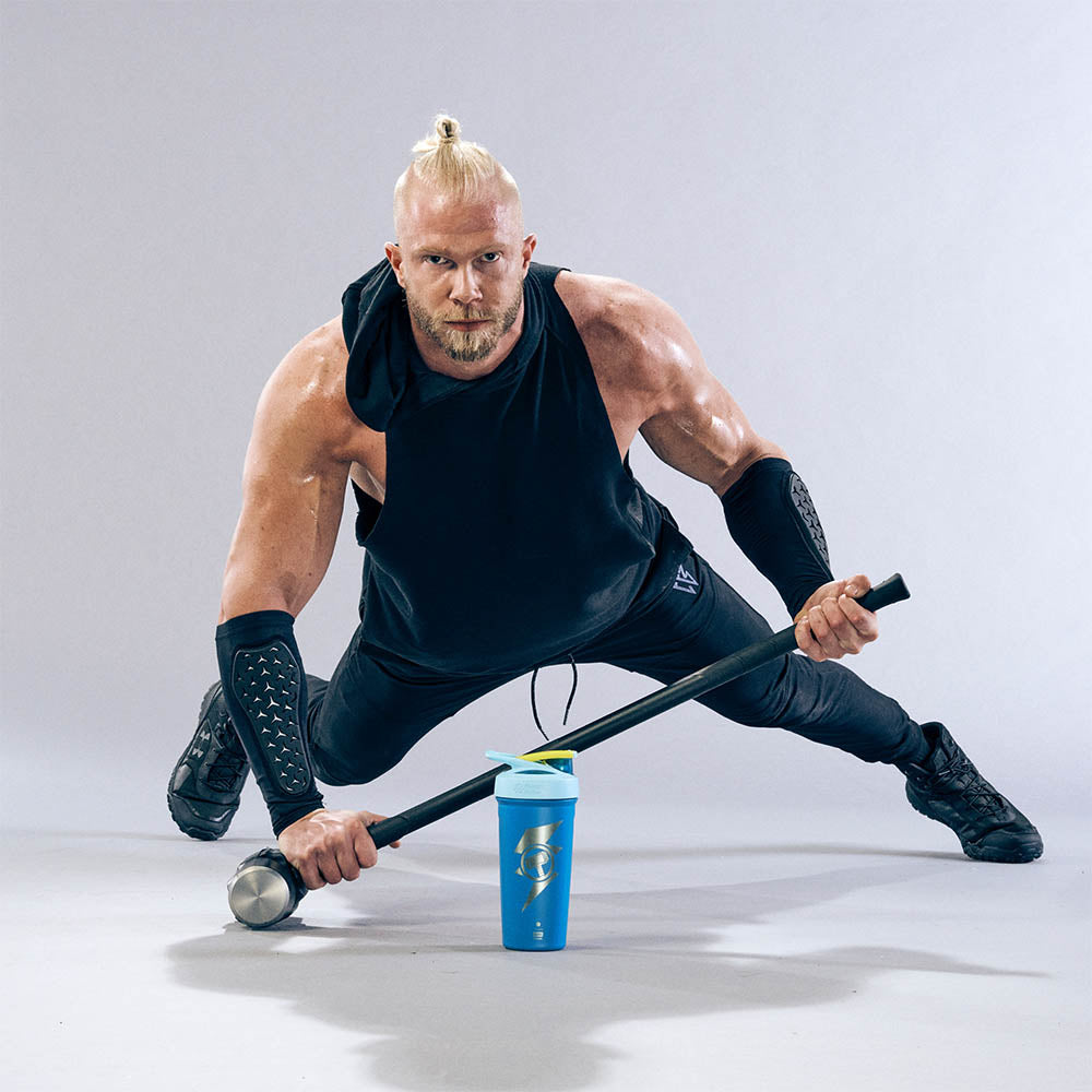 https://www.blenderbottle.com/cdn/shop/files/Man_who_looks_like_Thor_working_out_with_his_Thor_shaker_on_the_floor.jpg?v=1677090790&width=1000